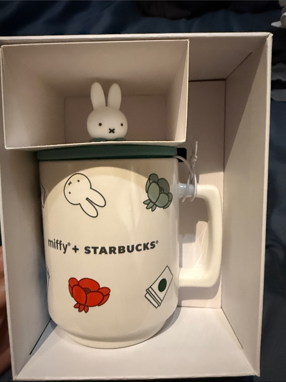 Starbucks Cream Ceramic Mug with Green Lid and Red Floral Accents